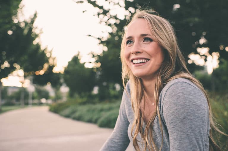 woman happy about being at luxury detox