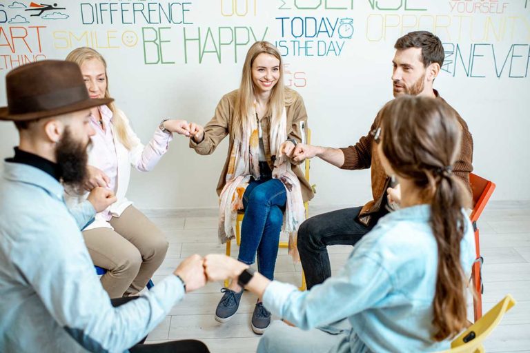 group partakes in an intensive outpatient therapy program